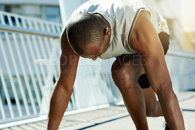 Buy stock photo Runner, start and fitness with black man in city for health, cardio challenge or marathon practice. Exercise, running athlete and workout training with person on bridge for sports, urban and wellness