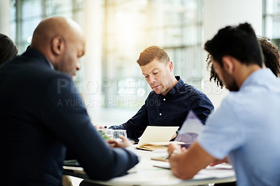 Buy stock photo Reading, team and planning with business people in meeting for investment, research or budget proposal. Collaboration, treasury advisor or liquidity manager with employees for account report