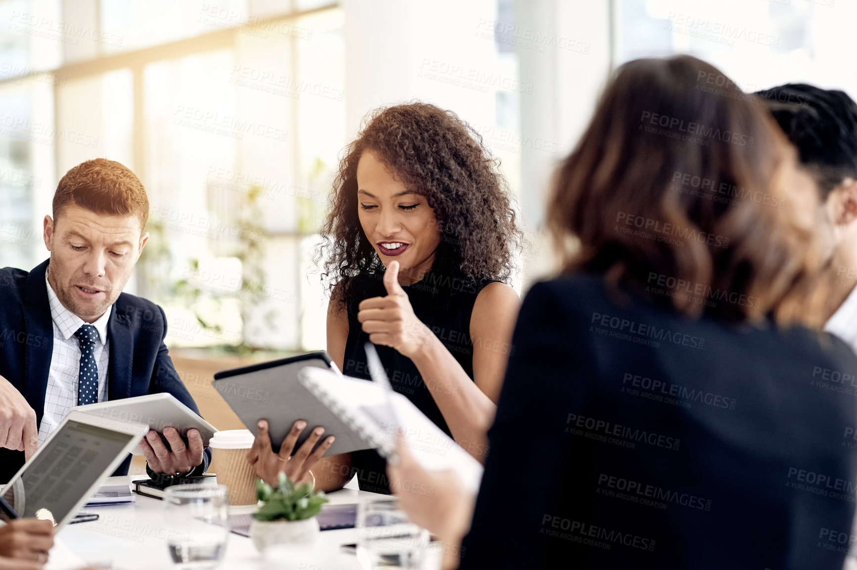 Buy stock photo Team meeting, tablet and businesswoman with thumbs up for agreement, policy review and discussion. Planning, like gesture and happy group with technology for compliance idea with feedback in office