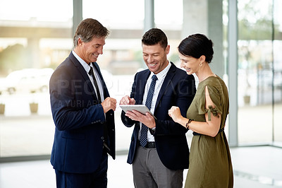 Buy stock photo Tablet, funny group and business people talk in office for investment banking, coaching and advice. Technology, team and corporate meeting with manager for financial planning, laugh and training