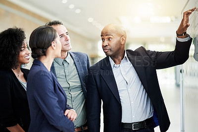 Buy stock photo Team, whiteboard and business people in meeting for planning, discussion and solution for proposal. Corporate, office and workers with notes brainstorming for strategy, tasks and project management