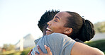 Black couple, happy and love outdoor with hug for commitment, relationship reunion and bonding. Excited, man and woman together for quality time, space or romantic connection or support in summer