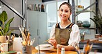 Woman, portrait and happy in small business for pottery, handmade bowl and creative workshop. Entrepreneur, art and ceramic in studio for craft production, painting and smile for commission project