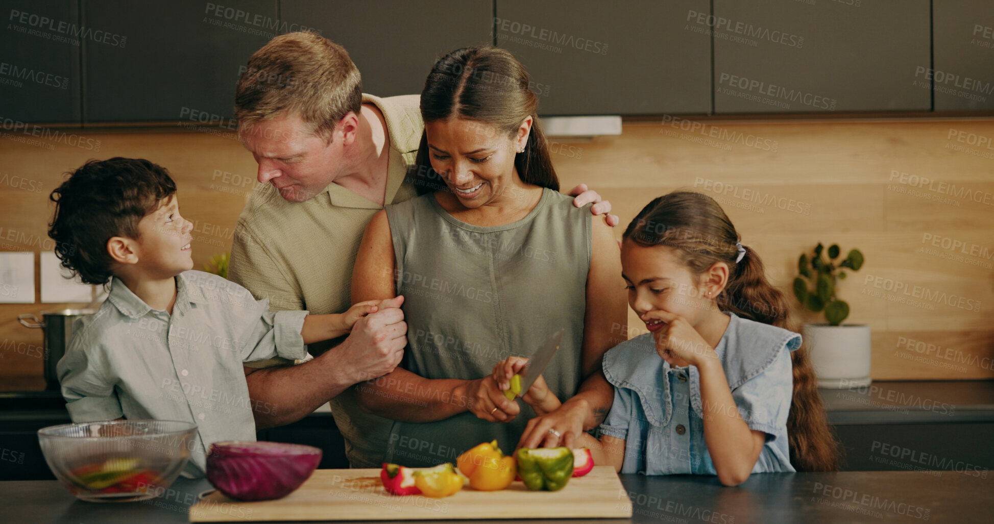 Buy stock photo Parents, cooking and laughing with children, kitchen and helping mom with vegetables and bonding. Learning, recipe and happy people with kids, interracial and meal prep with family or love in house