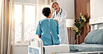 Happy, doctor and woman in hospital with support, speaking and good news for breast cancer remission. Medical worker, mature person and discussion in clinic with smile, disease recovery or assurance.