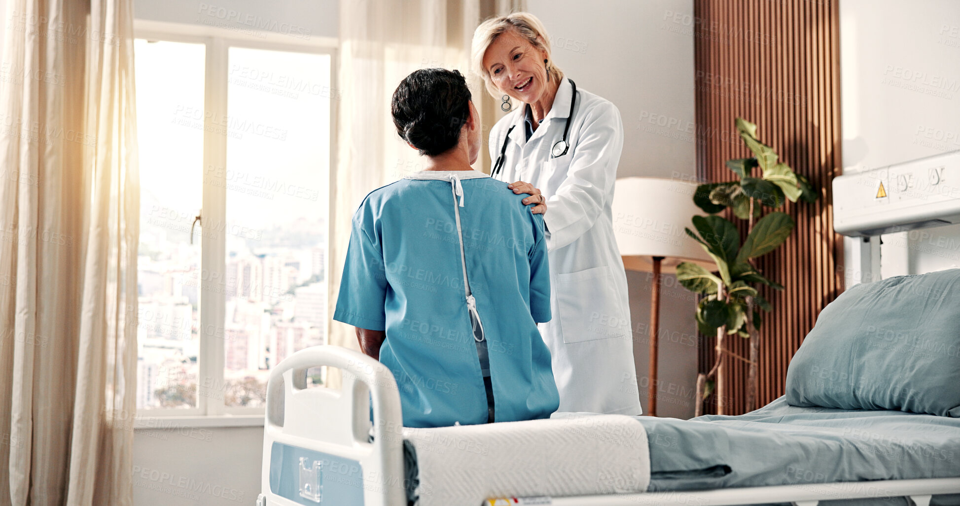 Buy stock photo Happy, doctor and woman in hospital with support, speaking and good news for breast cancer remission. Medical worker, mature person and discussion in clinic with smile, disease recovery or assurance.