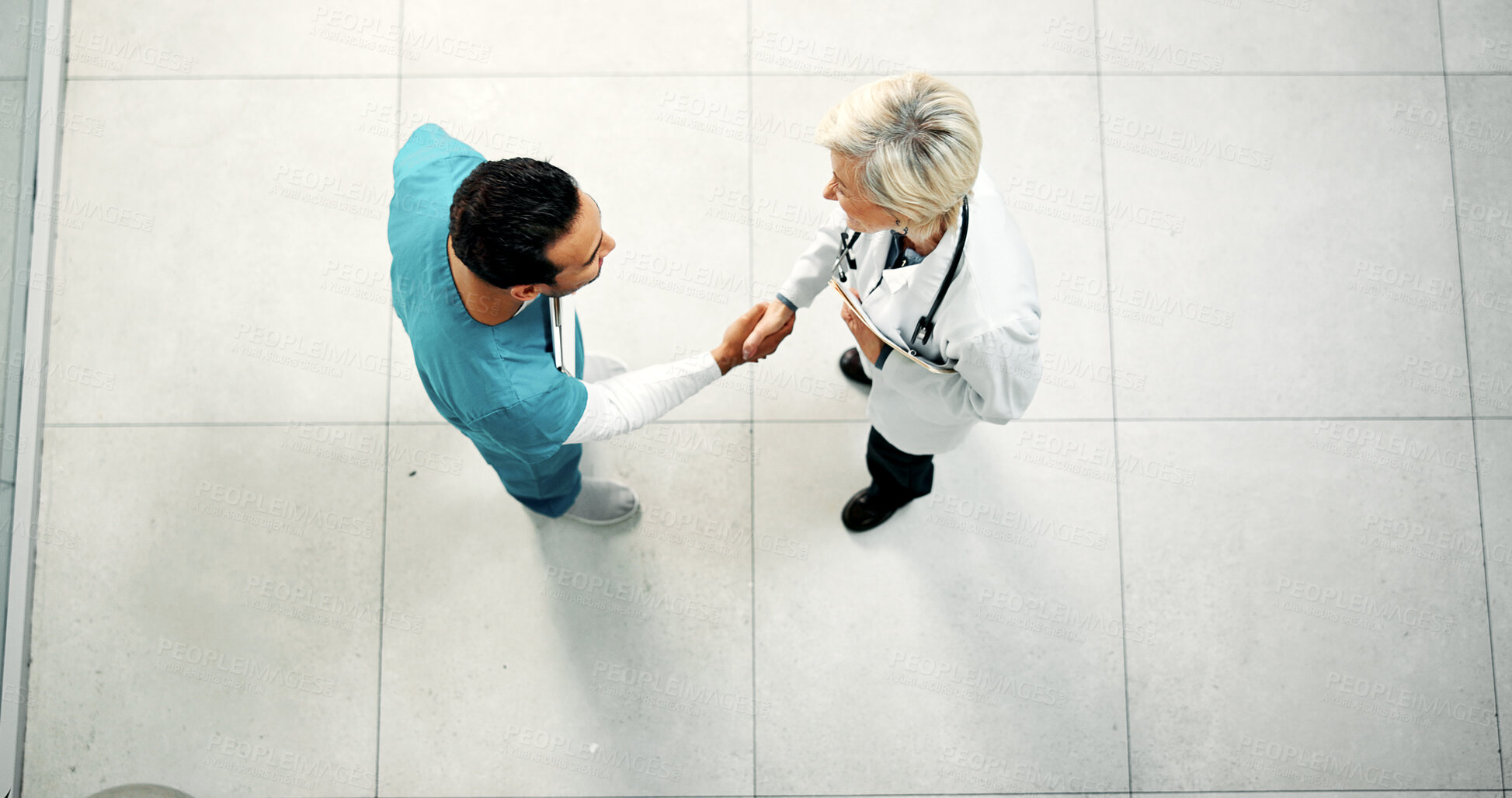 Buy stock photo Doctor, team and handshake with nurse for healthcare agreement, greeting or welcome new member. People, above and shaking hands in hospital for partnership, medical collaboration and introduction