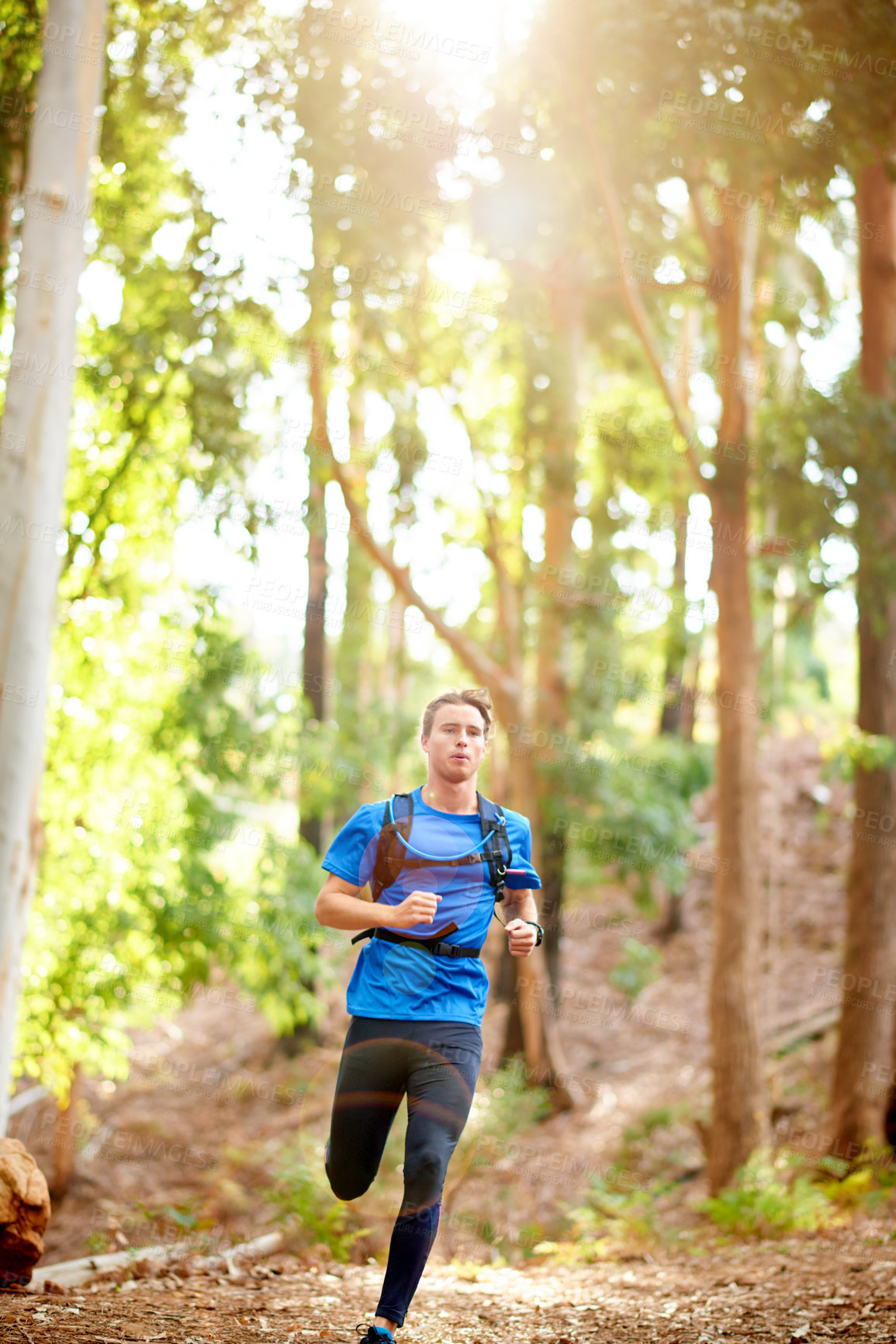 Buy stock photo Hiker, running and man in nature for exercise, marathon training and cardio workout. Sports, athlete and person outdoor for fitness, endurance and challenge for wellness, health and energy in forest