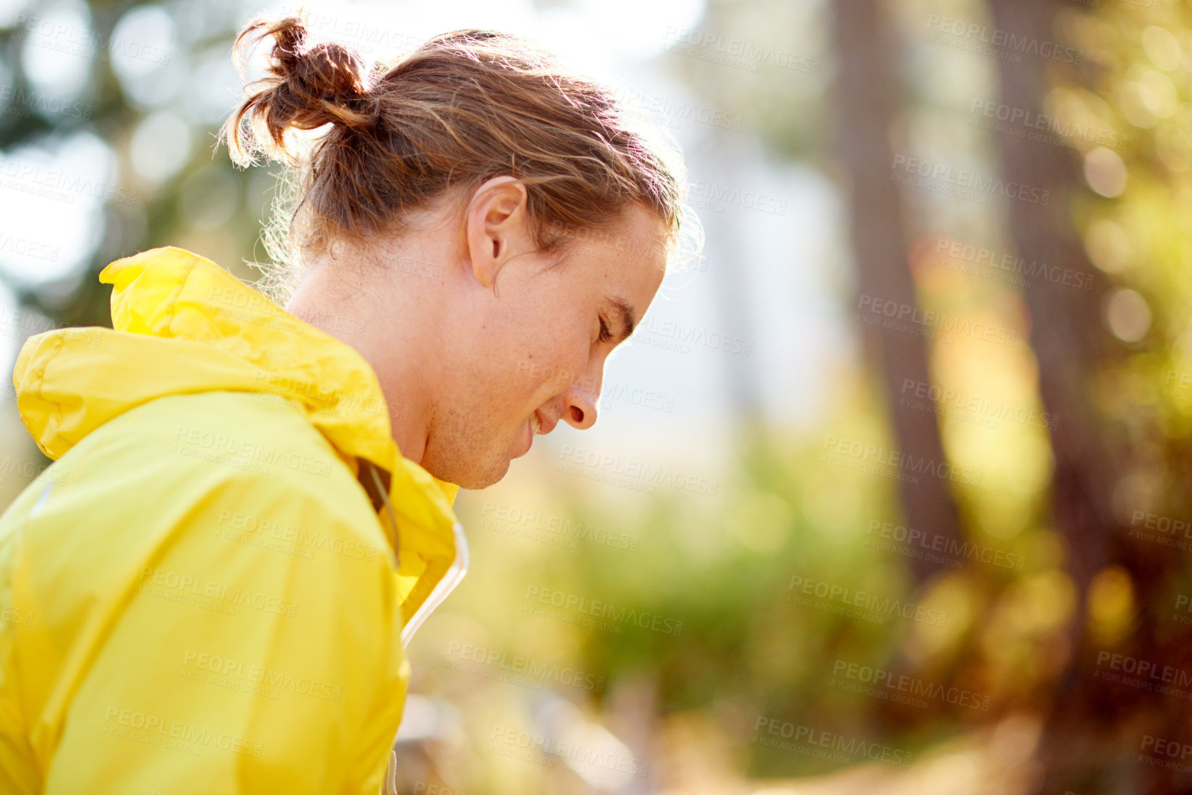 Buy stock photo Break, runner and man with smile, outdoor and training in morning for wellness, thinking and woods. Fitness, athlete and person with sportswear on jog, resting and contemplating in nature or forest