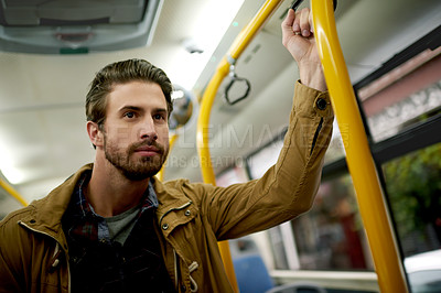 Buy stock photo Destination, public transportation and travel with man on bus for commute in city as holiday or vacation passenger. Balance, coach and shuttle with person waiting in vehicle for journey or trip