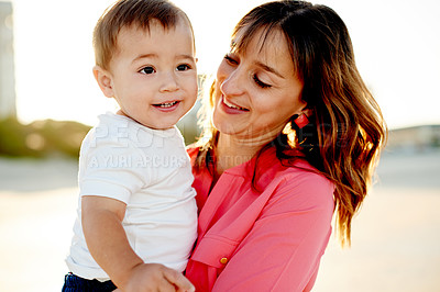 Buy stock photo Smile, family and mom with child at beach for bonding, relationship and relax in nature. Ocean, travel and mother with boy for holiday, vacation and weekend trip for support and sunset adventure