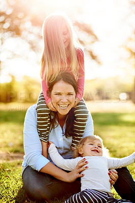Buy stock photo Outdoor, portrait and mother with children for support, relationship and connection together in park. Happy family, mom and girls with love for bonding, caring and play on weekend holiday in nature