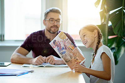Buy stock photo Home, father and girl with learning guide, love and kid with support, reading and growth. Alphabet for education, family and parent with daughter, child development or academic pamphlet with brochure