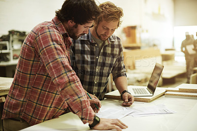 Buy stock photo Men, paper and teamwork in carpentry workshop for trade, woodwork and supply chain. Collaboration, blueprint and artisan planning in warehouse for production, project checklist and small business
