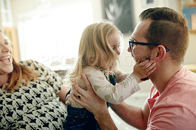 Buy stock photo Happy, parents and play with child on sofa for love, affection and funny games for weekend break. Smile, people and embrace with toddler laughing for fun together, family bonding and support at house