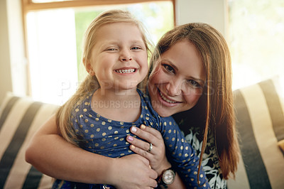 Buy stock photo Mother, kid and hug with portrait in home for love, support and connection with girl. Sofa, mom and embrace child for care, safety or happy parent bonding with daughter for trust with family together