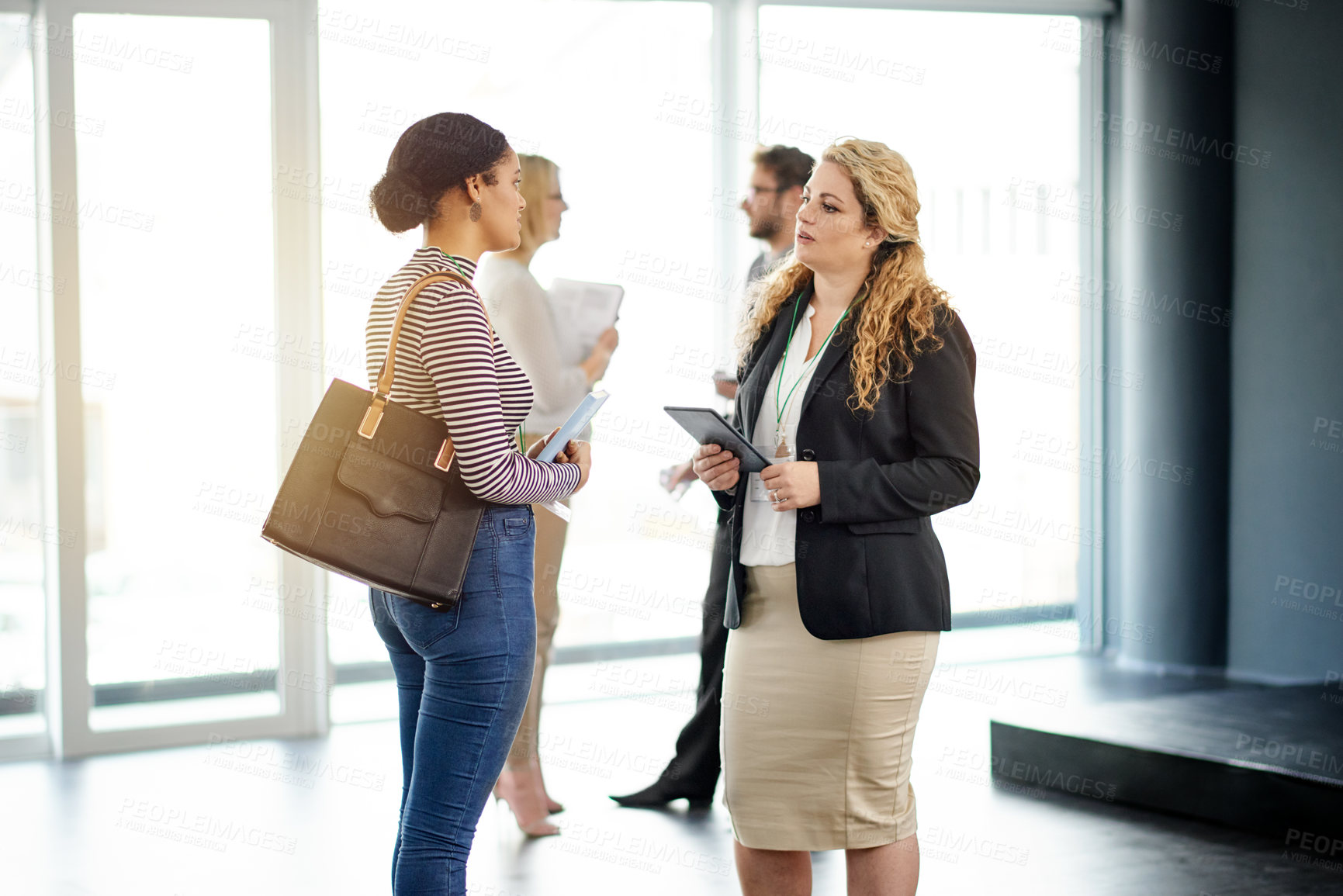 Buy stock photo Team, help and tablet with business people at Conference for tradeshow host, discussion and schedule. Convention guide, online agenda and event assistant with employees at seminar for meeting