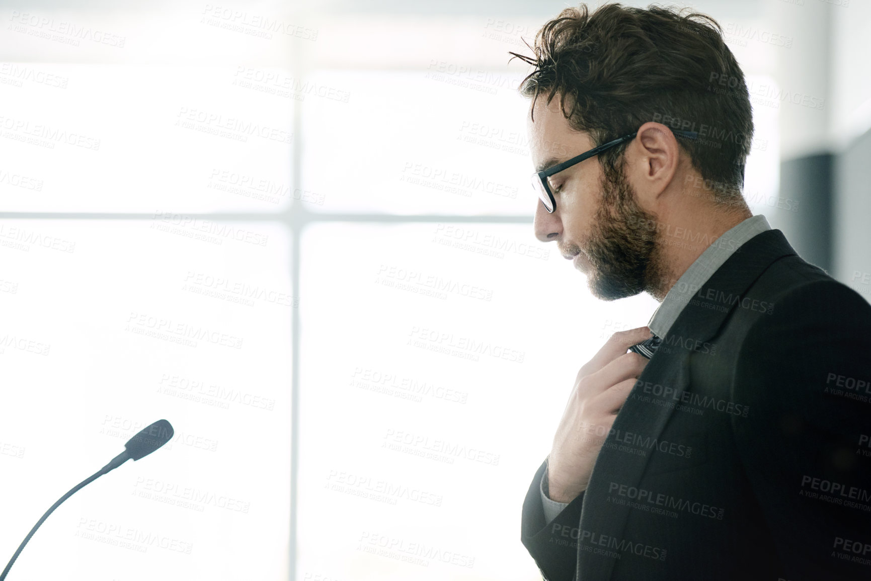 Buy stock photo Presentation, anxiety and man in office with mic, nervous or thinking for company meeting. Speaker, stress and employee in boardroom with inhale, business review or preparation for speech.