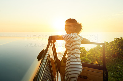Buy stock photo Portrait, happy and woman with car, ocean and road trip in nature with transport, flare and journey. Outdoor, tourist and person with vehicle for adventure, space and confident on summer vacation