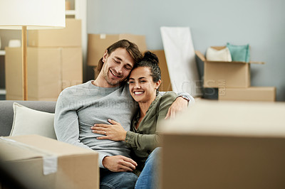 Buy stock photo New home, happy and couple hug to relax after moving, relocation and real estate purchase. Homeowners, bonding and man with woman with embrace, love and support for property, mortgage and house