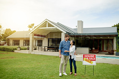 Buy stock photo Sold sign, happy and new home for couple, hug and milestone for homeowner with property and purchase. Outdoor, embrace and people with investment of house, yard and achievement for relationship