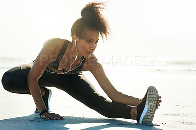 Buy stock photo Workout, woman and leg stretching on beach with earphones to start running, fitness or cardio album. Mockup space, athlete and warm up on sand for sports performance, endurance and marathon podcast