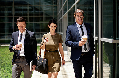 Buy stock photo Walking, coffee and smile with business people in city for labor advocate, legal team and morning commute. Travel, attorney partnership and drink with employees outdoor for court case discussion
