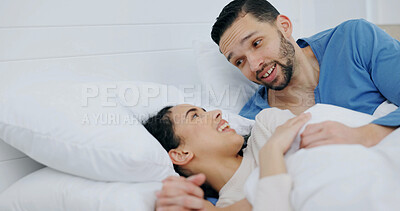 Buy stock photo Couple, relax and talking in bedroom with smile, love and partner support for romantic morning. Happy, people and romance at house with spouse, discussion and comfortable in bed for weekend unwind