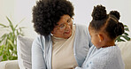 Grandma, smile and bonding with child in home, love and laughing with granddaughter in living room. Family, connection and happy senior black person with girl, retirement and relax together in lounge