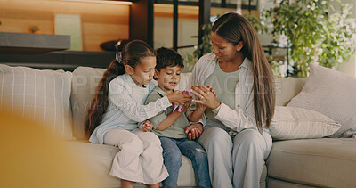 Buy stock photo Happy, toys and children with mom on sofa for bonding, connection and playing together on weekend. Family, home and mother with boy, girl and game for development, trust and relationship on couch