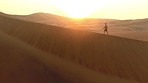 Wandering through a desert sunrise