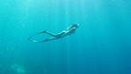 Woman swimming in the ocean