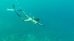 Woman swimming in the ocean