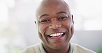 Portrait of one mature African American man with a bright smile and deep dimples looking content and attentive against bright copyspace background. Happy black man with natural white laughing 