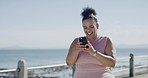 One young plus size woman celebrating a weight loss journey and focusing on health, cardio, fitness and energy. Happy hispanic woman getting fit with a run and speed walking outside at the beach