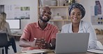 Portrait of two black business people smiling while working in an office. Happy colleagues eager to collaborate as a dedicated team. Confident designers planning for success in a creative startup