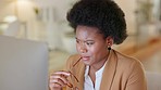 Worried business women looking stressed about missed deadlines, sitting at a desk inside an office. Anxious and busy office worker checking planner or diary for meeting and appointment schedule
