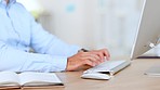 Hands of business man typing on a keyboard and using a wireless mouse at a desk inside an office. Busy male employee writing emails and managing appointments in a modern workplace with copy space