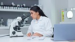 Laboratory scientist looking in microscope to examine monkeypox on a glass slide. Biochemist engineer searching for breakthrough virus cure through medical research and writing discovery on clipboard