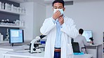 Phd scientist wearing a face mask and goggles for safety in a research lab. Portrait of a medical pathologist looking confident in finding a cure. Dressed in protective gear for a test and experiment