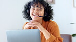 Portrait of a friendly call center agent using a headset while consulting for customer service and sales support in an office. Young woman smiling and laughing while working remotely on a laptop