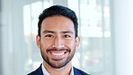 Closeup of laughing software engineer looking forward with confidence after developing a foolproof system that cannot be hacked. Portrait of a proud, young manager or technology expert standing alone