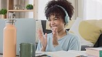 Cheerful online tutor clapping her hands to motivate her students while working remotely at home. Excited black ESL teacher showing her learners how to express joy with gestures in a virtual class