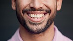 Happy, satisfied and friendly male with beard showing his perfect smile and teeth. Closeup mouth of confident man expressing a positive attitude and mindset. Good oral hygiene means healthier smiles