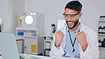 Cheerful, happy and excited scientist celebrating his success after reading email about good news. Healthcare worker typing on laptop and feeling like a winner after making a medical breakthrough