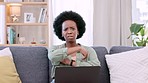 Angry, unhappy and frustrated woman checking laptop for salary, earnings and pay in home living room. Portrait of sulking, grumpy and sad afro lady feeling impatient while waiting for trading profit