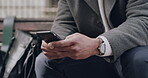 Hands typing on phone sending business email, text message or playing online games close up. Corporate businessman on social media or browsing internet for fake news on digital mobile device.