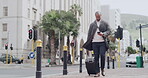 Businessman carrying suitcase on business travel, traveling or walking to the airport in a modern city street. Busy texting corporate professional with luggage, suitcase or baggage arriving overseas