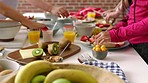 Colorful, healthy morning breakfast made to eat and enjoy a meal with female friends. Closeup of fresh, organic fruit for health, vitality and wellness. A bright diet food spread to start the day