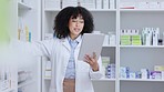 Smiling, happy and female doctor speaking to a patient online on a tablet and prescribing medicine for pain or headache. Young, cheerful and multiracial medical professional helping a customer.